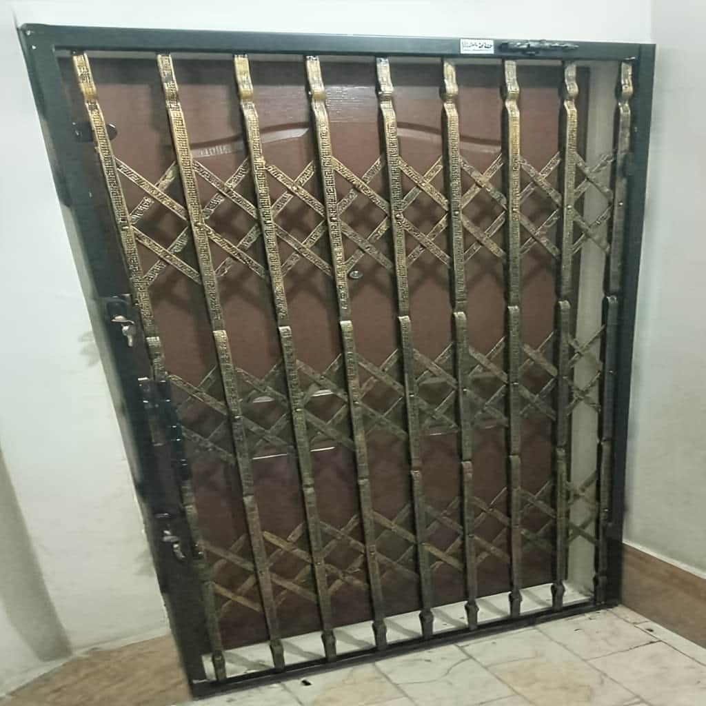 قیمت درب آکاردئونی حفاظ آپارتمان سه&zwnj;گل در رفسنجان